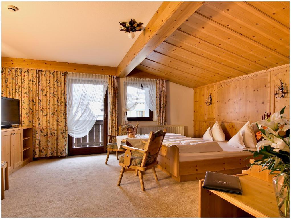 Deluxe Driepersoonskamer met Balkon